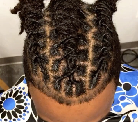 Mahogany Designs Unlimited Salon - Riverside, CA. Retwist and style