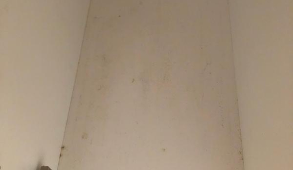 Black & White Home Services - Upper Caboolture, QLD. Uncleaned kitchen cupboard