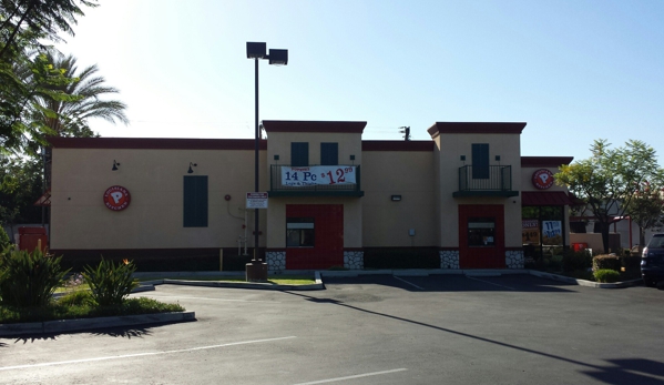 Popeyes Louisiana Kitchen - El Monte, CA. Outside with drive-thru