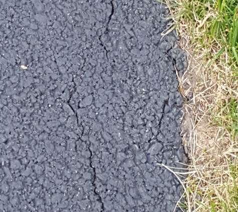 Petersen Sealcoating and Paving Inc - Lake In The Hills, IL. After 1 yr, was told by the company that  " Nobody warranties against cracks near the edges ". Very disappointed.