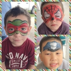 Making faces by May ( face painter)