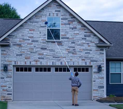 Stonewall Pest Control - Inman, SC. Taking down all the spider webs and wasps nests around the house high and low.