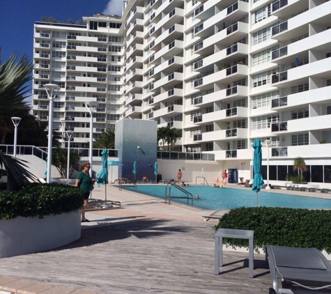 Decoplage Realty - Miami Beach, FL