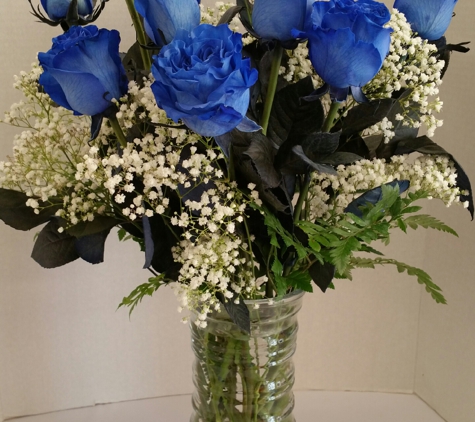 Central Florist - Albany, NY. Blue Roses are special!