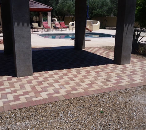 Building Block Masonry - Phoenix, AZ. Brick patio with a herringbone pattern