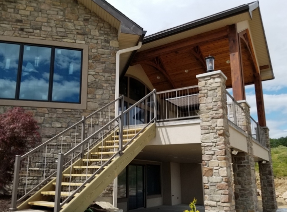 American Fence & Flag - Whitehall, PA. Vertical cable railing on stairs and deck