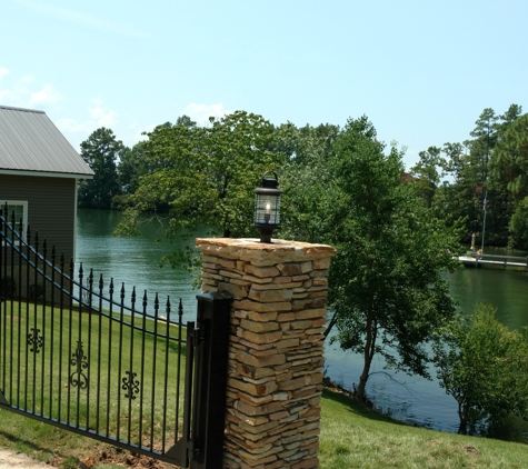 Johnson Electric - Opelika, AL. Lights on colums we installed at lake