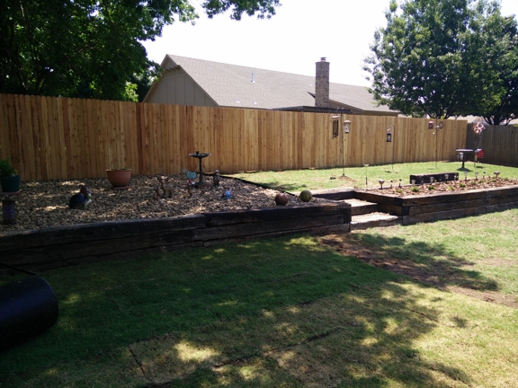 Paul's Tulsa Services - Tulsa, OK. Rock garden/sod/fence install