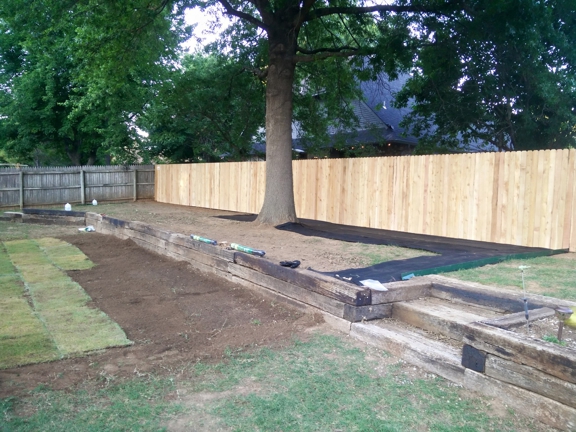 Paul's Tulsa Services - Tulsa, OK. Rock garden/sod/fence install