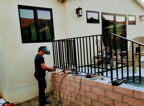 CraftIron - Goleta, CA. INSTALLING THE CUSTOM MADE IRON WORK IN A SANTA BARBARA BACKYARD