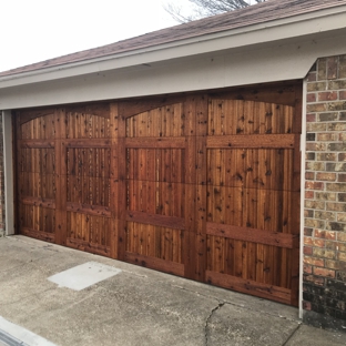 Viking Overhead - Burleson, TX. Solid cedar overhead garage door and custom trim by Kyle at Viking! Couldn’t be more pleased!