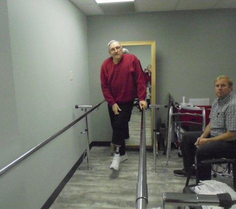 Excel Prosthetics & Orthotics - Kingsport, TN. Trying my new prosthetic on parallel bars.