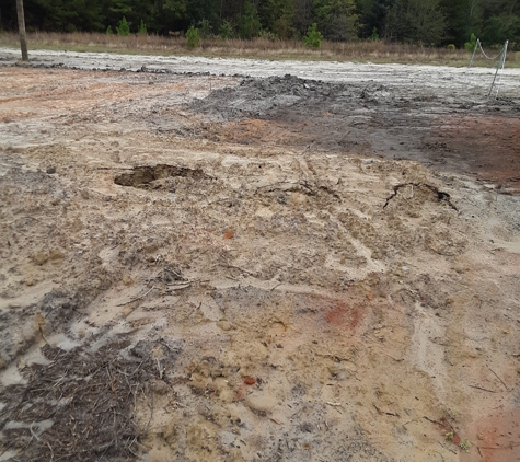 Green's Landscaping & Irrigation. dirt caved in around septic/incorrectly dug swale