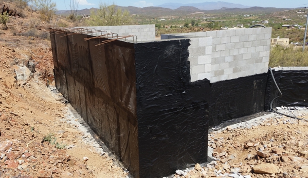 Building Block Masonry - Phoenix, AZ. Block basement walls with waterproofing along the outside