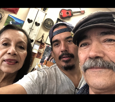 The Village Cobbler - Houston, TX. Mother, Son & Father