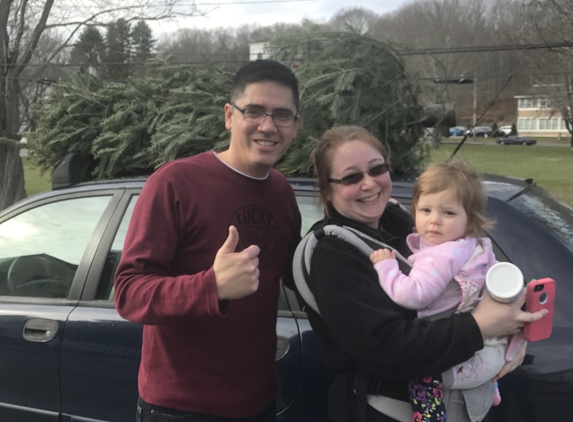 Saviour Septic, llc. Another happy family with a tree from Saviour Septic LLC. Merry Christmas!