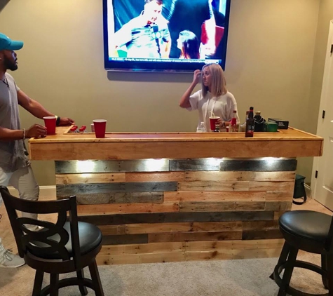 Cowboy Builds, Inc - Kennesaw, GA. Birmingham Basement gets a pallet wood bar custom built by Cowboy Jeff