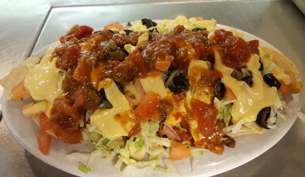 Dakota Farms Family Restaurant - Williston, ND. Super Nachos are a Appetizer..but really it's a meal!! Awesome!