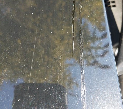 Elgin Hyundai - Elgin, IL. Damages that my car sustained while being in service there, plus the poor job of fixing the scratch. Instead of using spray paint as promise