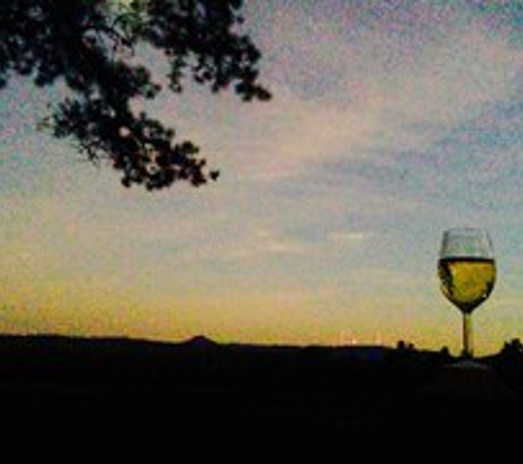 An Enchanting Evening - Roland, AR. A glass of wine with the nice view of Pinnacle Mountain