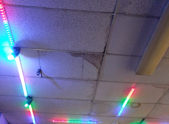 Skate 'N' Place - Bloomington, IL. We left for our safety.  Guessing there is plenty of mold in the ceiling.