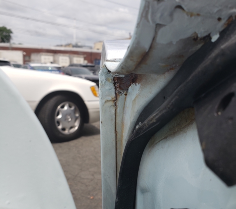 Circle Collision Ceneter - Nanuet, NY. Rust everywhere. Paid for all door jambs to be by free of rust