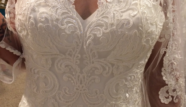 Midsouth Wedding Gown Sales & Rentals - Collierville, TN. Close up of our beautiful lace work, hand cut, placed & sewn