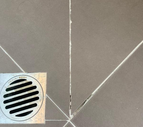Scott O'Brien Property Maintenance - Mannering Park, NSW. Poor grouting job fone on tile replacement