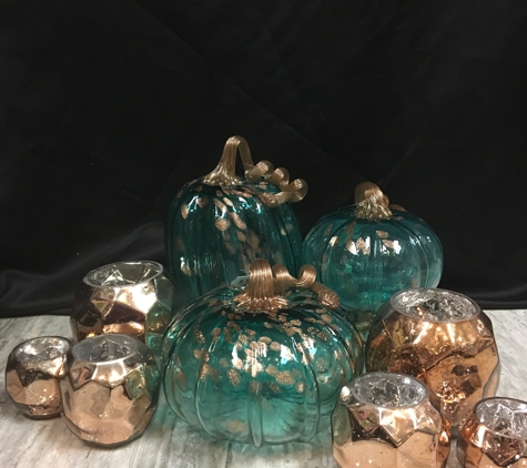Andres' Day Spa & Unique Gifts - Henrico, VA. Pumpkin and votives the perfect table setting