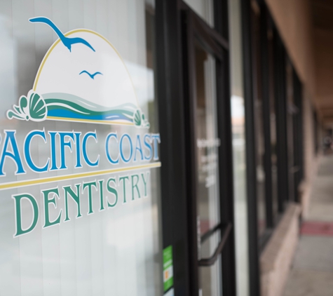 Pacific Coast Dentistry - Paso Robles, CA. Signage on glass pane at Pacific Coast Dentistry Paso Robles