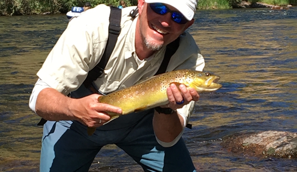 Blue Quill Angler - Evergreen, CO. Big brown. Took 5 min to get landed!