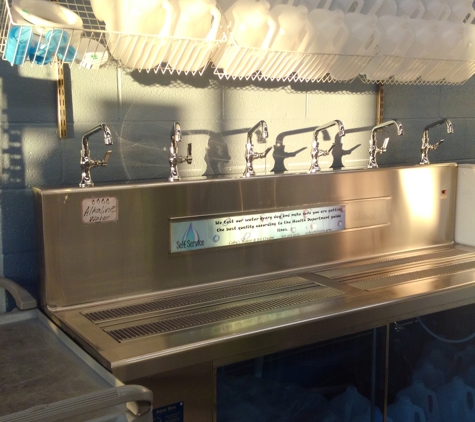 Coby's Water & Ice Cream - Calimesa, CA. 6-faucet fill station, leftmost is Alkaline, carts for your convenience