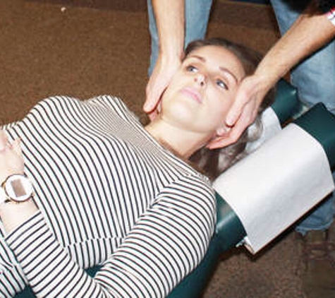 Dorr Chiropractic - Dorr, MI. Chiropractor Mike Dumond performs a cervical adjustment in order to restore proper neck range of motion