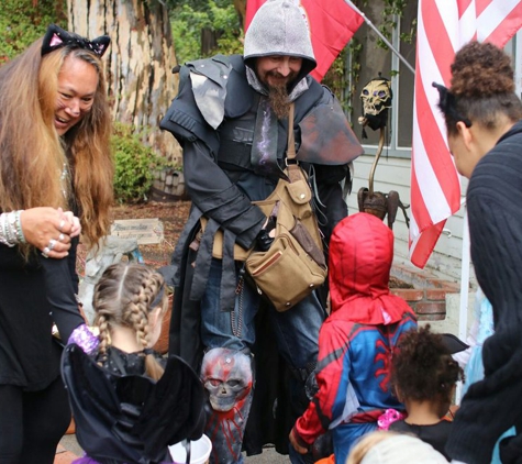 Children's Country House - Altadena, CA. This neighbor was fully committed to greet our children in the morning of the Helloween. Thank you, Ms Rebecca, for organizing this!