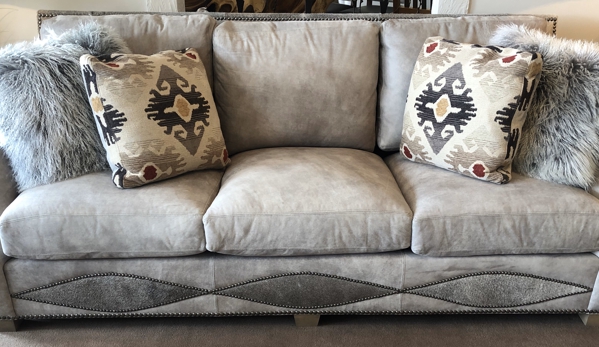 Reno Tahoe Rustic Decor - Reno, NV. Loved this grey leather sofa from King Hickory. The regular price was over $6K and now only $2,999!  I wish I had a place for it!