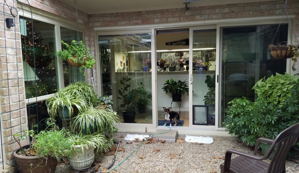 EnergyEfficientShop.com - Houston, TX. ENERGY EFFICIENT SLIDER DOOR WITH PET DOOR INSTALLED