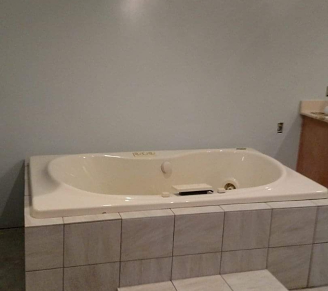 Affordable Remodeling and home repair - Dayton, OH. jacuzzi tub relocation and ceramic tile install.