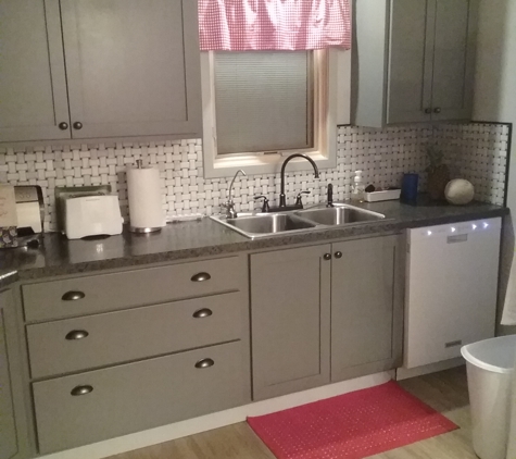 Pioneer Cabinetry - Sergeant Bluff, IA. Full doors, no panels under sink.  Great!