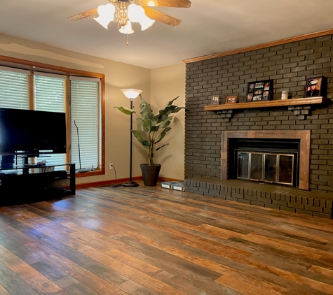 Kehns handyman services - Florissant, MO. New Livingroom floor and fireplace makeover