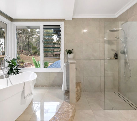 Bradnam's Windows & Doors - Warana, QLD. Frameless Fixed Shower Screen