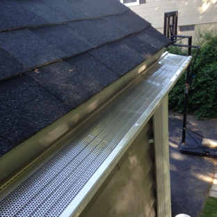 Aces Home Improvement, LLC - Manchester, CT. Seamless gutters and downspouts with micro-guard leaf protection