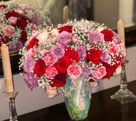 Beyond Treats - Byhalia, MS. Wine bottle floral arrangements