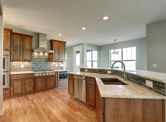 Camerata Homes - Foxfield, CO. Open kitchen with large island