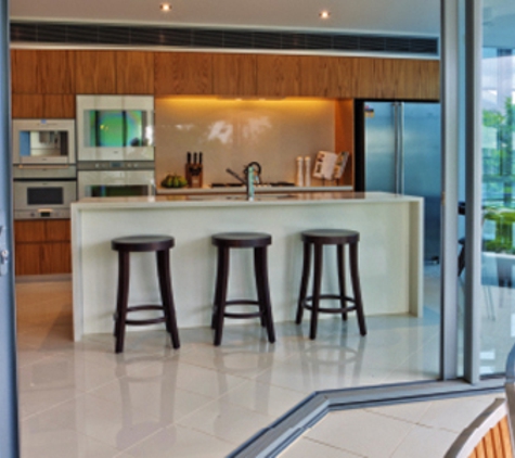 Bradnam's Windows & Doors - Bungalow, QLD. Ultra Silver Aluminium Corner Sliding Door