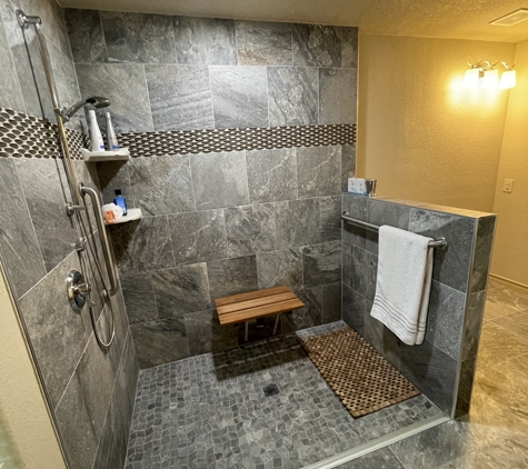 Texas ADA Home Remodeling - San Antonio, TX. Roll-in Shower with a Teak Fold Down Shower Bench