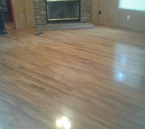 Moore's Painting LLC - Ruston, LA. After with 12mm laminate wood flooring