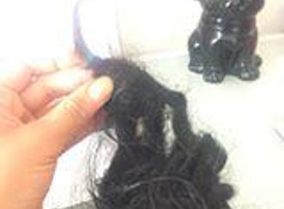 African Braidz Hair Extensions - Fortitude Valley, QLD. two weeks after purchase - if i wanted dred locks i would have purchased them.