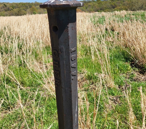 Cornerstone Surveying - Springdale, AR. 1877 milepost on Cherokee boundary