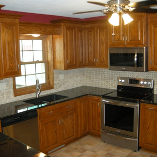 Dawson Contracting Inc - Marshall, MO. Granite tops, tile backsplash, custom cabinets and windows