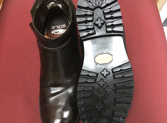 Mike's Shoe Repair - Las Vegas, NV. Old work boots made new!  Thanks Mike!